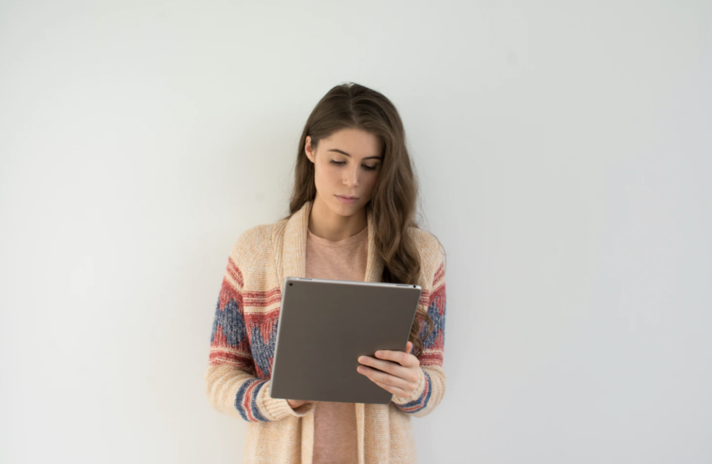 academic support girl holding tablet