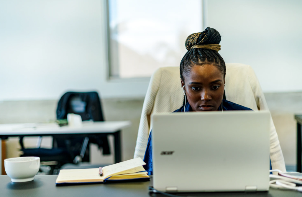 critical thinking skills, student sitting in front of laptop