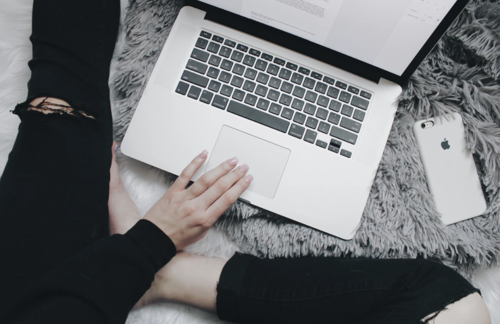 services at the university of windsor, black jeans, grey blanket, laptop