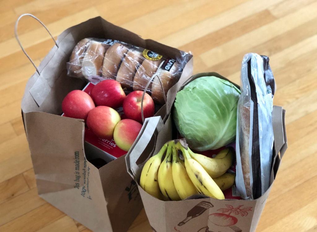 on-campus grocery spots, paper bags with fruits