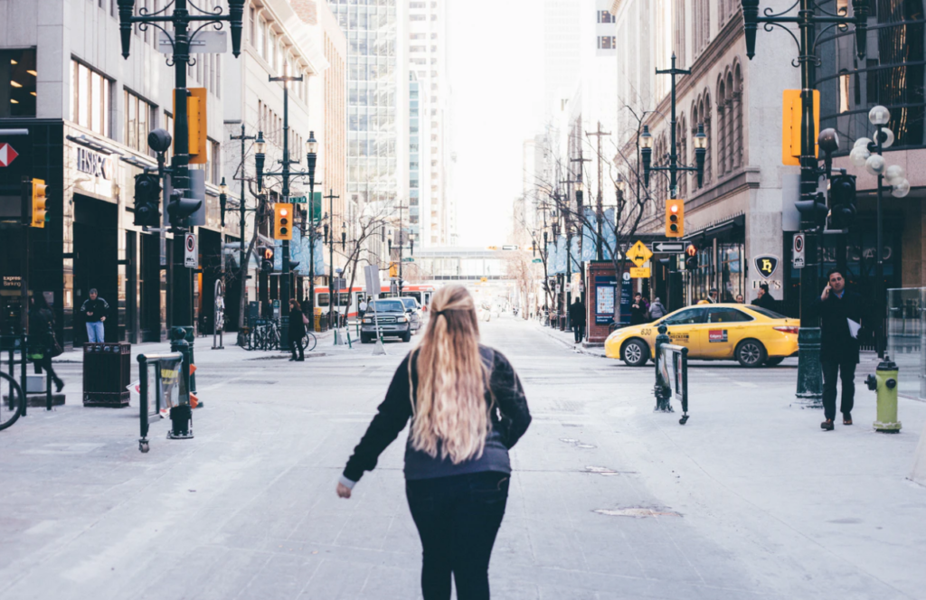 mental health resources at the university of calgary, student walking on street