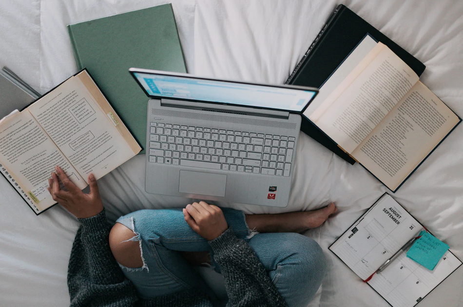 study at douglas college, student with laptop and notebooks