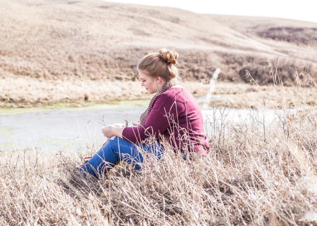 mental health resources woman sitting outside